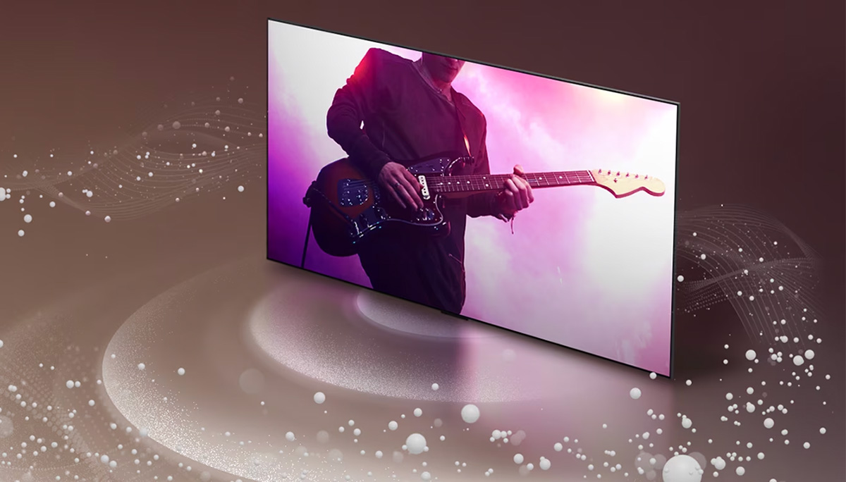 Μια LG OLED TV με φυσαλίδες ήχου και κύματα να εκπέμπονται από την οθόνη και να γεμίζουν τον χώρο.